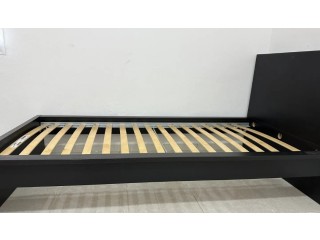 Wooden single bed