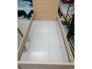 Wooden single bed